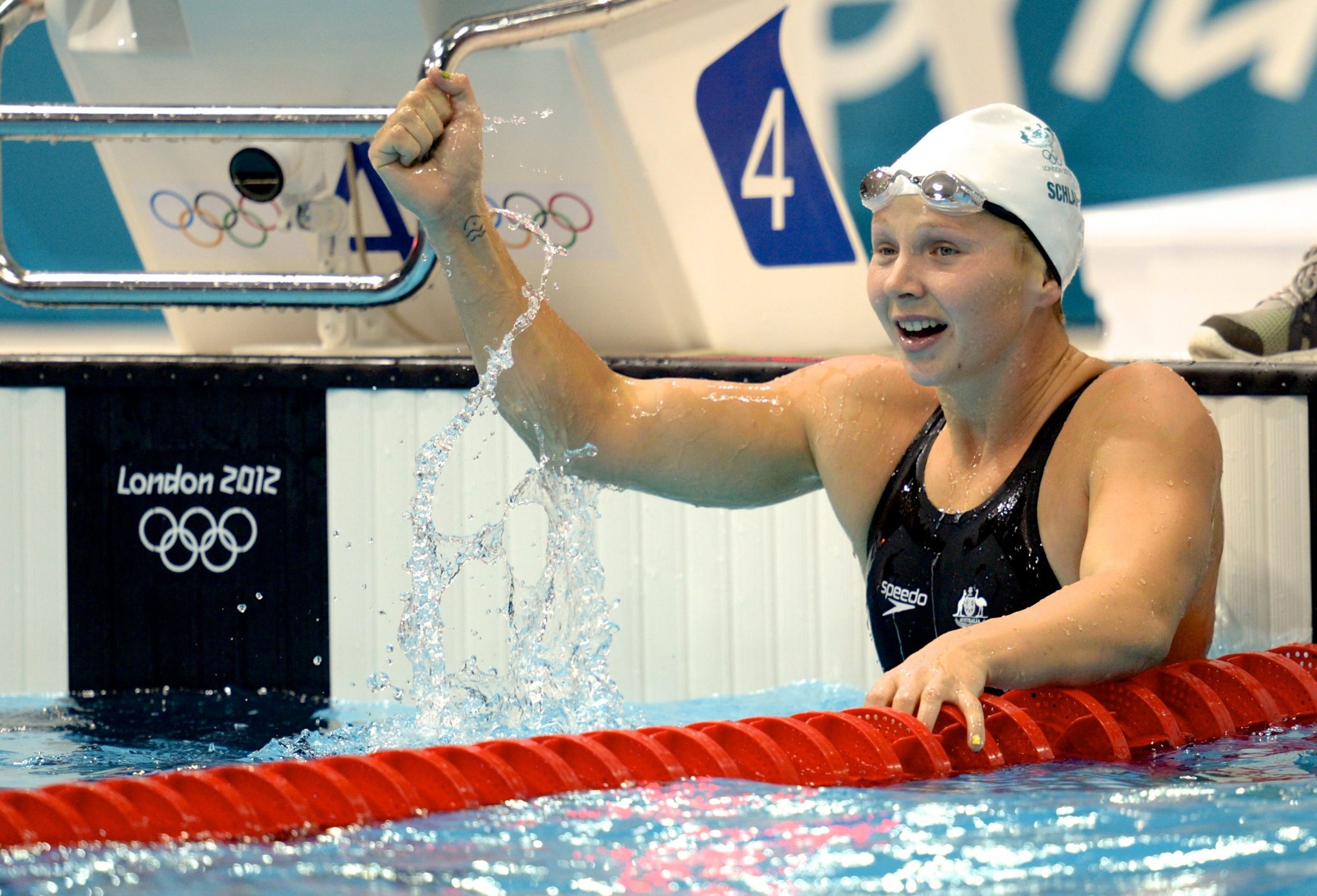 What brought twotime Olympic champ back to the Sunshine Coast