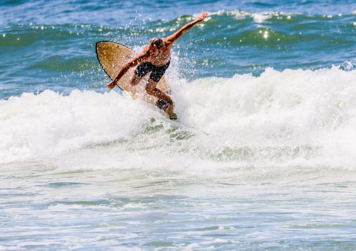 Sunshine-Coast-News-North Caloundra Surfing School Instructor Joey, surfing in the waves at Kings Beach. Photos captured by Sherry at Aloha Photography.
