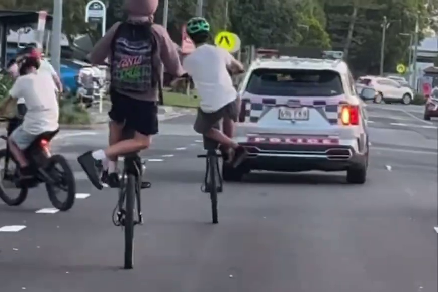 Kids exhibiting dangerous e-bike riding behaviours.