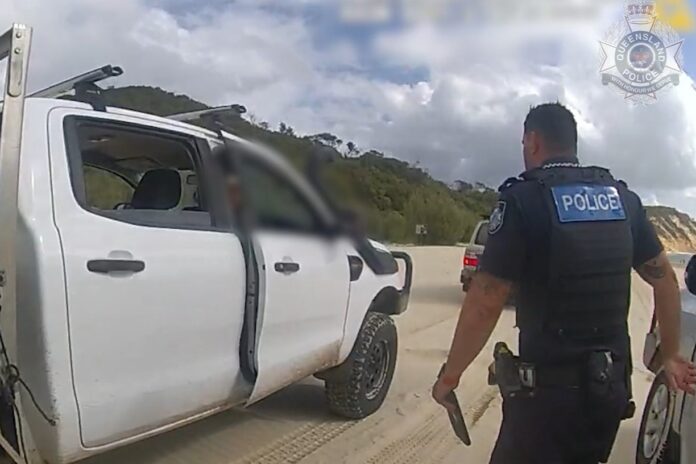 Police pull over a motorist at Noosa North Shore.