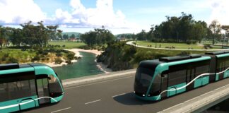 An impression of two metro buses on a bridge.