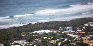 Houses along the coastline in the electorate of Fairfax. Picture provided by Shutterstock.