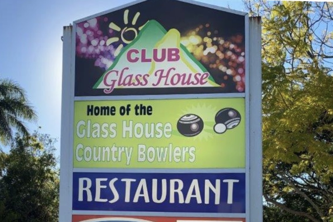 A Club Glass House sign.