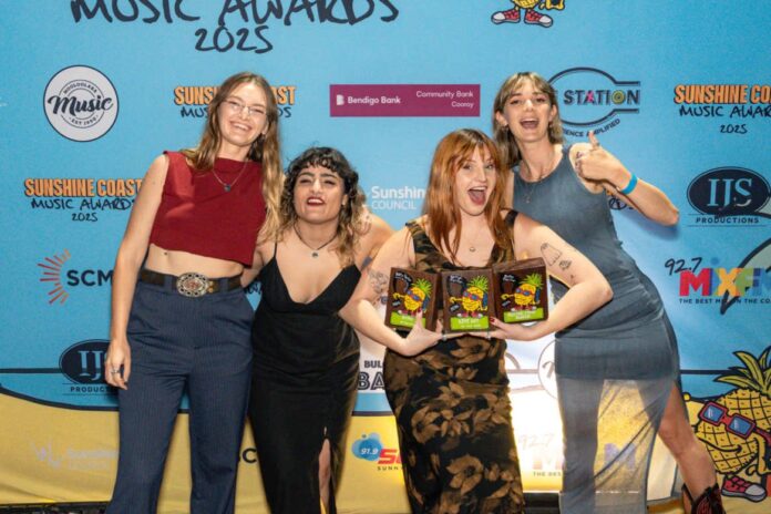 Betty Taylor members with their three 'golden pineapples' at the Sunshine Coast Music Awards. Picture: NHughes Media.