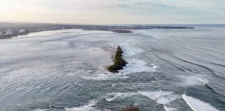 The breakthrough near the eroded Lions Park, in foreground, and the Bribie Bar in the background. Picture: Caloundra Bait and Tackle.