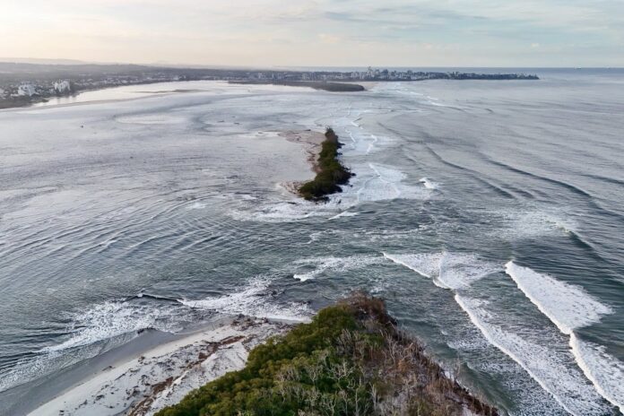The breakthrough near the eroded Lions Park, in foreground, and the Bribie Bar in the background. Picture: Caloundra Bait and Tackle.