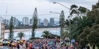 Runners at a previous edition of the Sunshine Coast Marathon, on the road at Alexandra Headland.