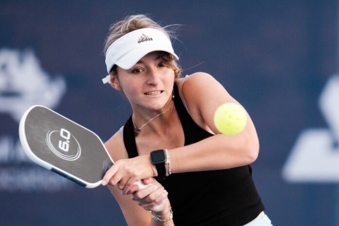 A pickleball player hits the ball with a Siz Zero paddle. Picture: Six Zero Pickleball.