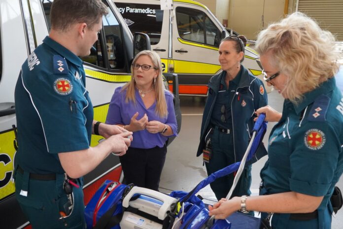 Caloundra MP Kendall Morton with emergency services workers.