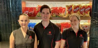 Nambour Cinema & Events Centre owner Luke Warburton, centre, with staff members Jemma and Halle.