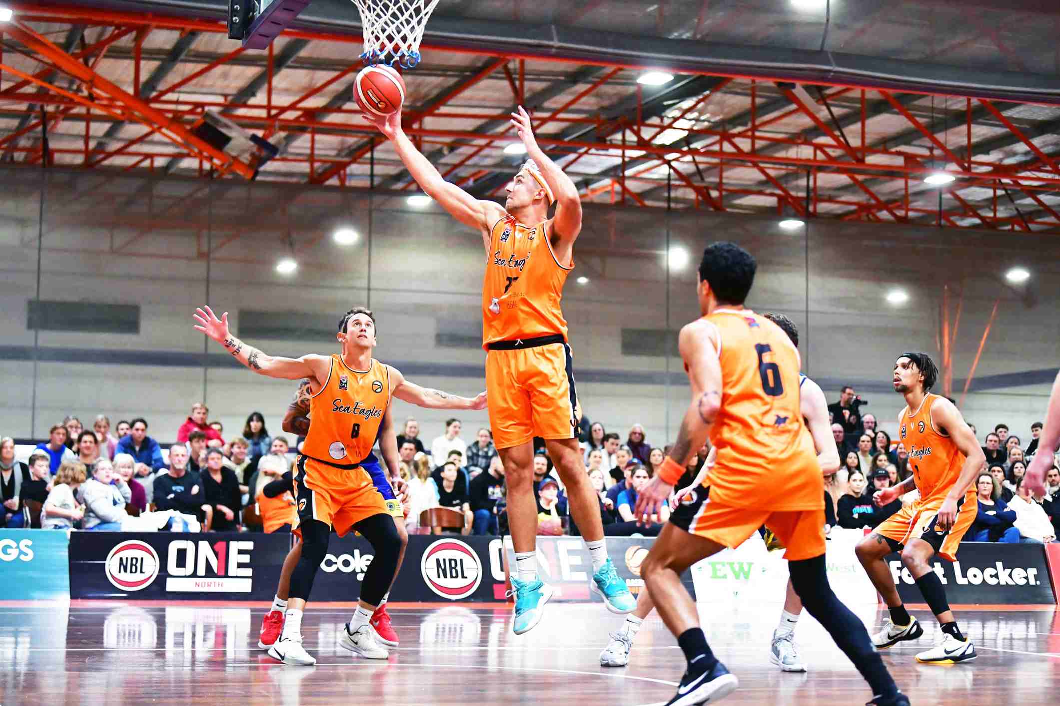 Basketball players in action.