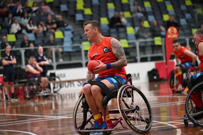 SCN091025 Dan van den Hoek’s AFL wheelchair sportsman