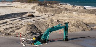An excavator was caught in deep sand at Bribie Island. Picture: Bluey's Photography.