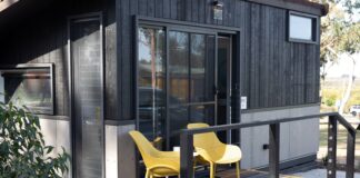 yellow outdoor chairs table setting cabin travel tiny home