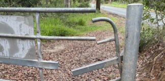 A damaged gate in the national park.