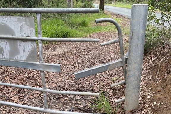A damaged gate in the national park.