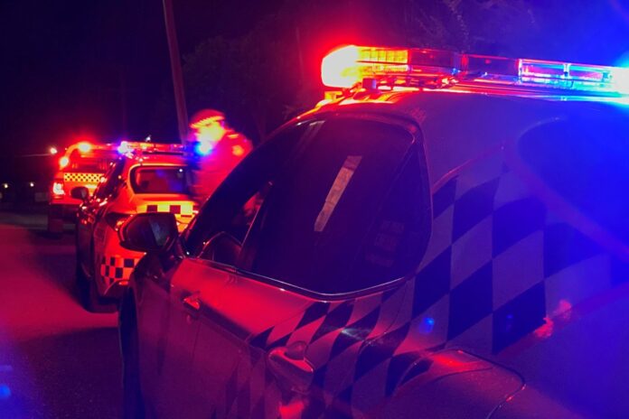 Police cars at night.