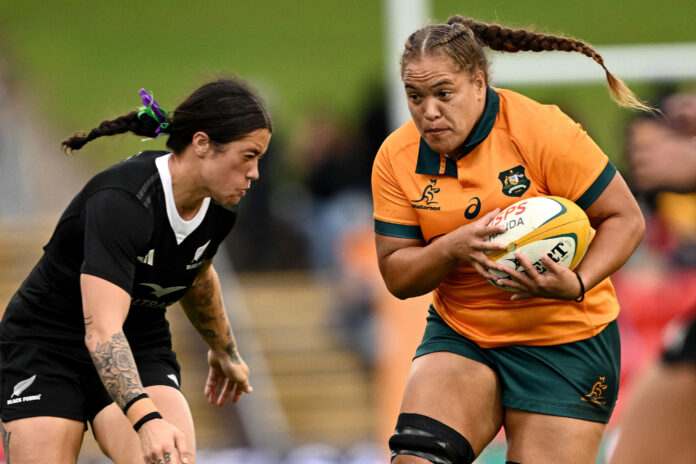 Ashley Marsters of the Wallaroos runs the ball against the Black Ferns last year.