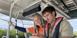 Unitywater CEO Anna Jackson and Wildlife Noosa’s Matt Wilson review footage from the drones, used to find and rescue injured wildlife.