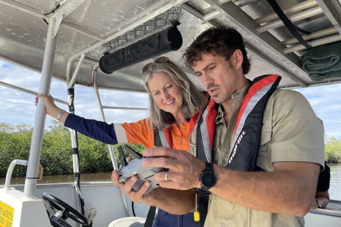 Unitywater CEO Anna Jackson and Wildlife Noosa’s Matt Wilson review footage from the drones, used to find and rescue injured wildlife.