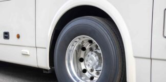 Close-up image of a large bus tyre.
