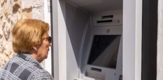 Senior woman using an ATM