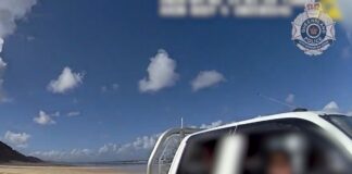 A driver is pulled over by police during the Easter long weekend. Picture: QPS.