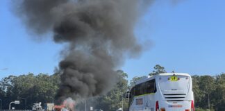 Smoke billows from the vehicle. Picture: Ben Beaden.