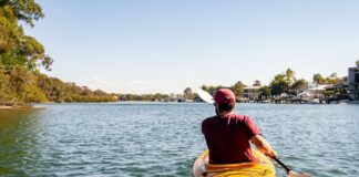 A man in a kayak at Noosa.
