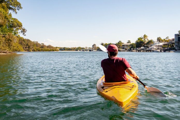 A man in a kayak at Noosa.