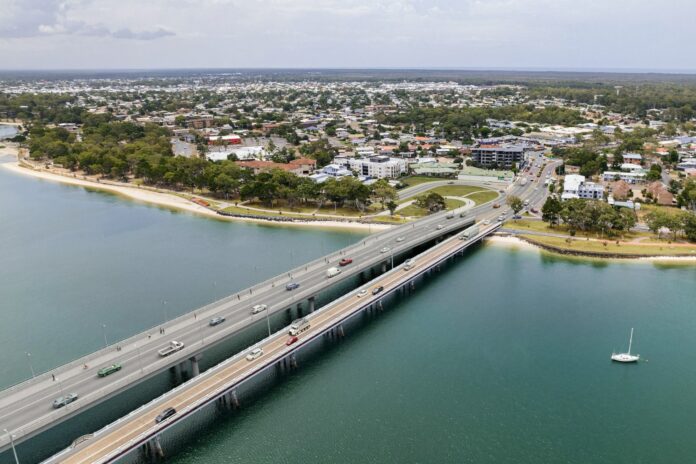 An artist's impression of the planned bridge alongside the current bridge.