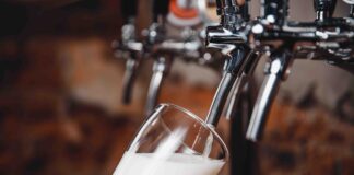 Ashley Robinson still finds pleasure in small, everyday things like beer despite economic uncertainty.