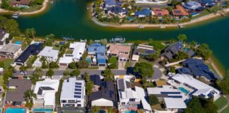 Solar panels dot the rooftops of Sunshine Coast homes.