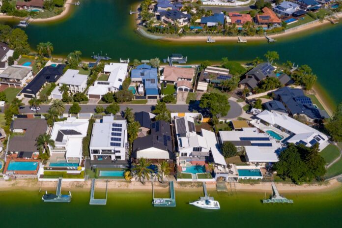 Solar panels dot the rooftops of Sunshine Coast homes.