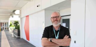 Advanced peer worker Robert Stanley in front of the new mental health crisis support space.