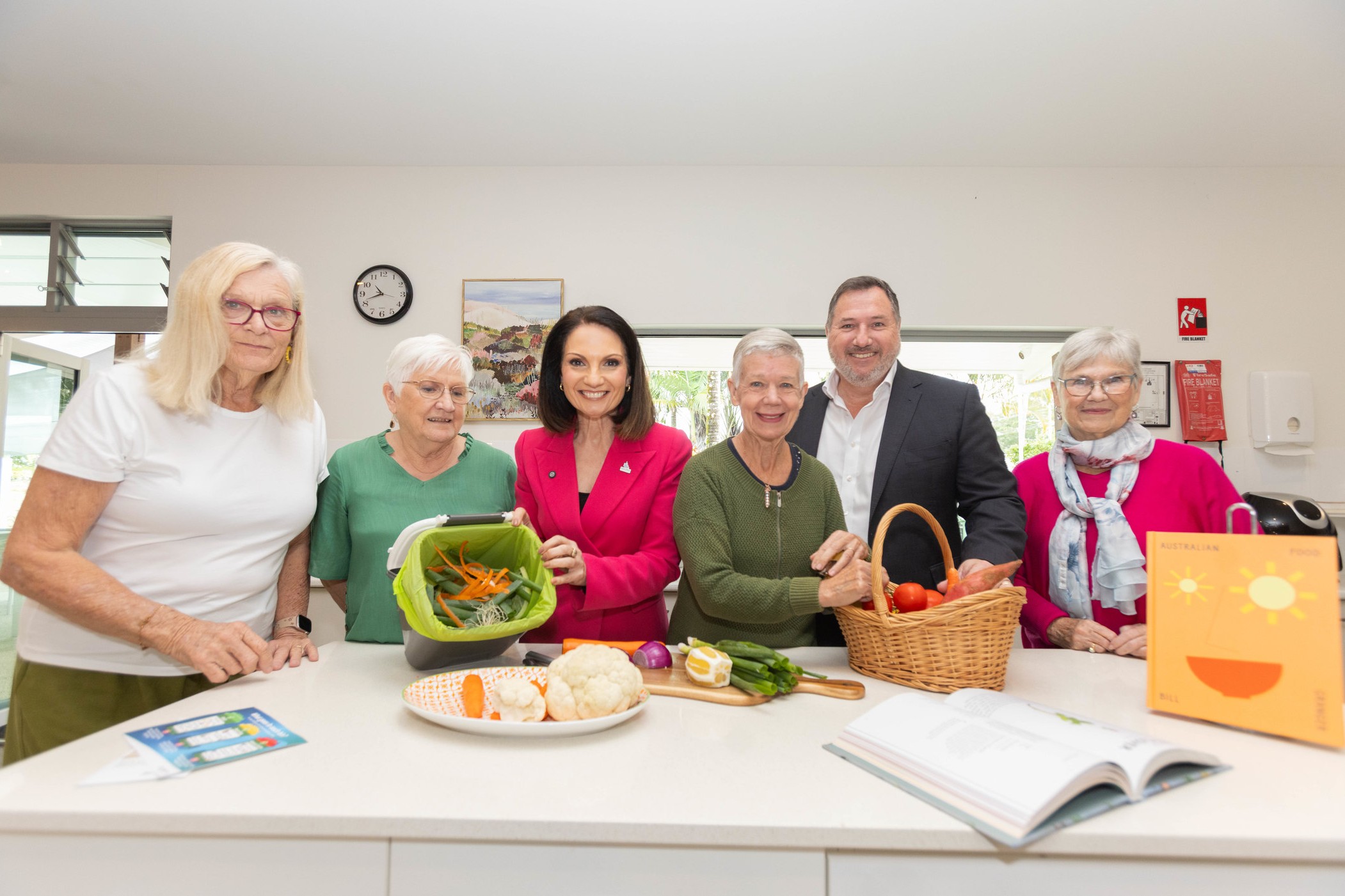 Minister Andrew Powell, Sunshine Coast Mayor Rosanna Natoli and IRT Palms residents participating in the food scraps trial