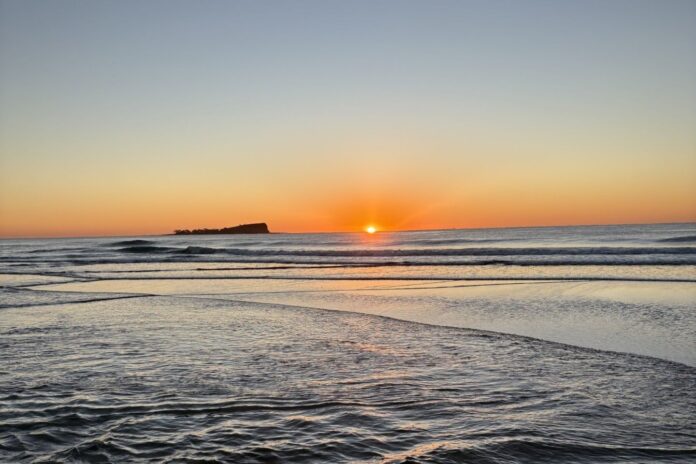 Photographer Rachel Martin captured the sun rising over Mudjimba Island
