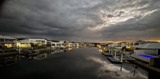 Photographer Tom Regener storm over Pelican Waters