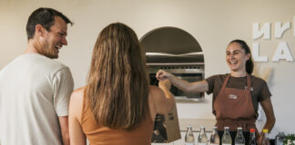 Urban Lamb co-founder Katrina Dickens serving a customer at the Buddina store.