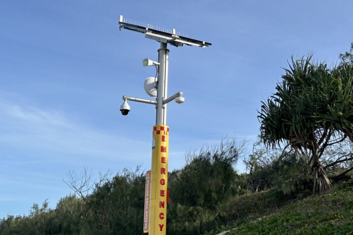 An emergency response beacon near the mouth of Stumers Creek at Coolum Beach.