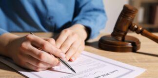 man writing his will. shutterstock