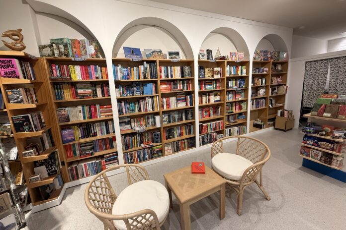 Annie’s Books on Peregian staff have been busy relocating books into their new, larger premises. Picture: Supplied