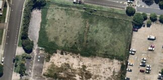 An aerial shot of a vacant site at Pacific Paradise.