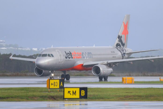 A Jetstar plane on the tarmac at Sunshine Coast Airport.