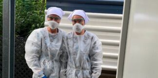 Twinnies founders Bridgette and Paula Powers in protective quarantine gear ahead of the arrival of a sick northern giant petrel. Picture: Facebook
