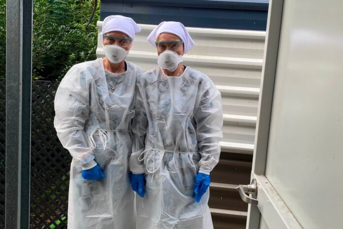 Twinnies founders Bridgette and Paula Powers in protective quarantine gear ahead of the arrival of a sick northern giant petrel. Picture: Facebook