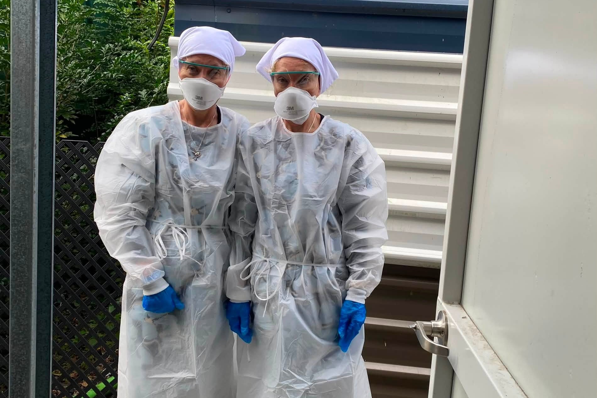 Twinnies founders Bridgette and Paula Powers in protective quarantine gear ahead of the arrival of a sick northern giant petrel. Picture: Facebook