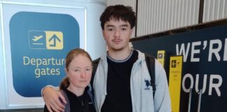 Aidan and Renee at Brisbane International Airport before flying to San Francisco for specialist treatment at Stanford University Hospital. Picture: GoFundMe