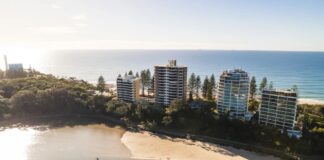 The four towers that stand out along Point Cartwright.