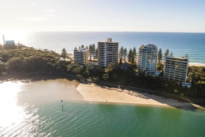 The four towers that stand out along Point Cartwright.